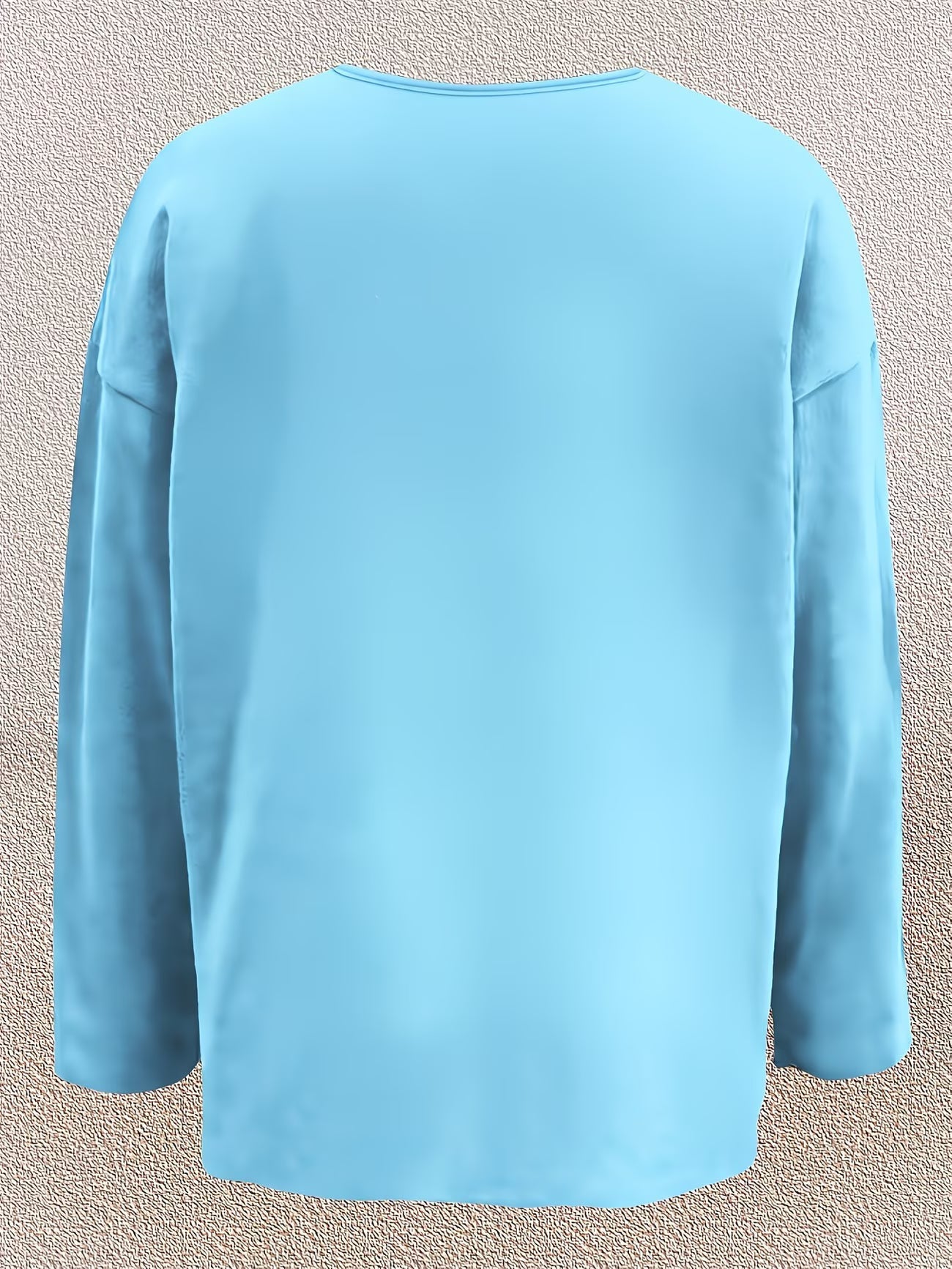 Olivira - Loose-fitting top with a nature-inspired floral pattern