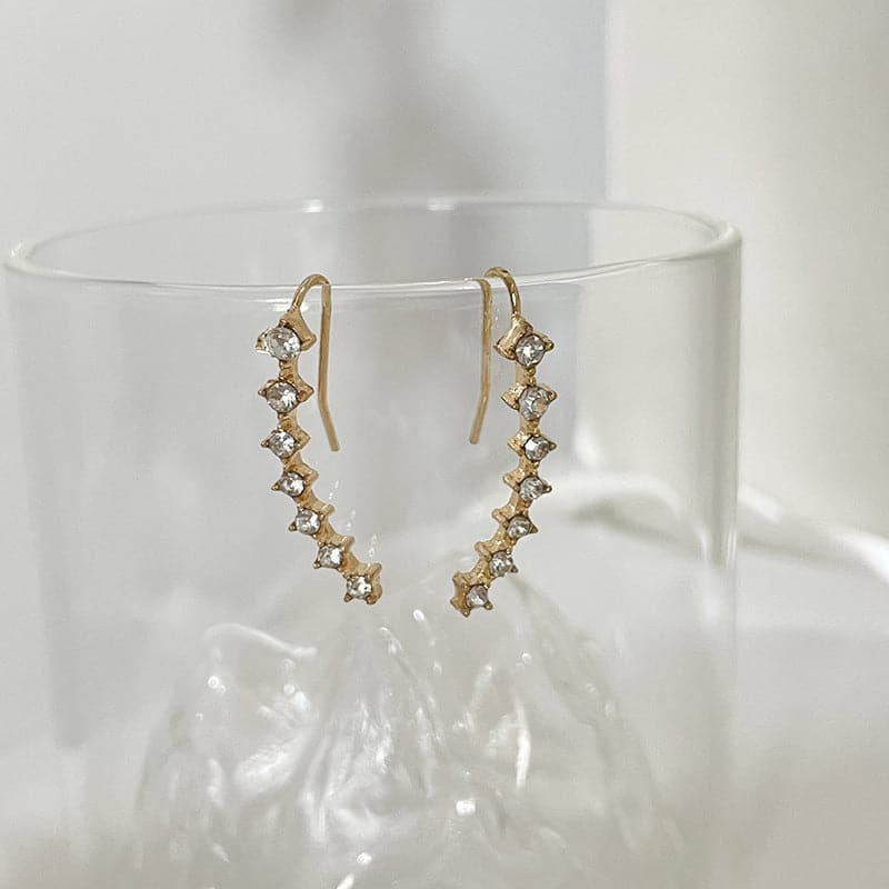 Océane - Boucles d'oreilles sept étoiles scintillantes