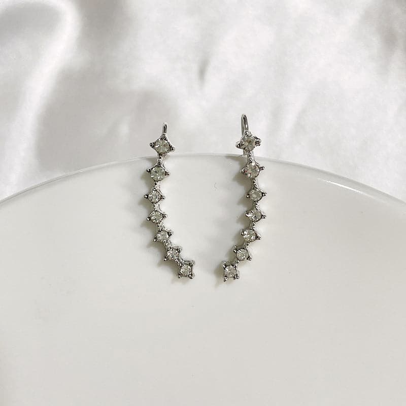 Océane - Boucles d'oreilles sept étoiles scintillantes