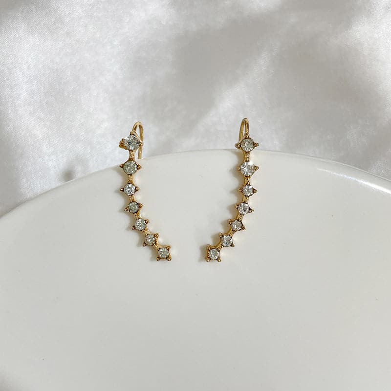 Océane - Boucles d'oreilles sept étoiles scintillantes