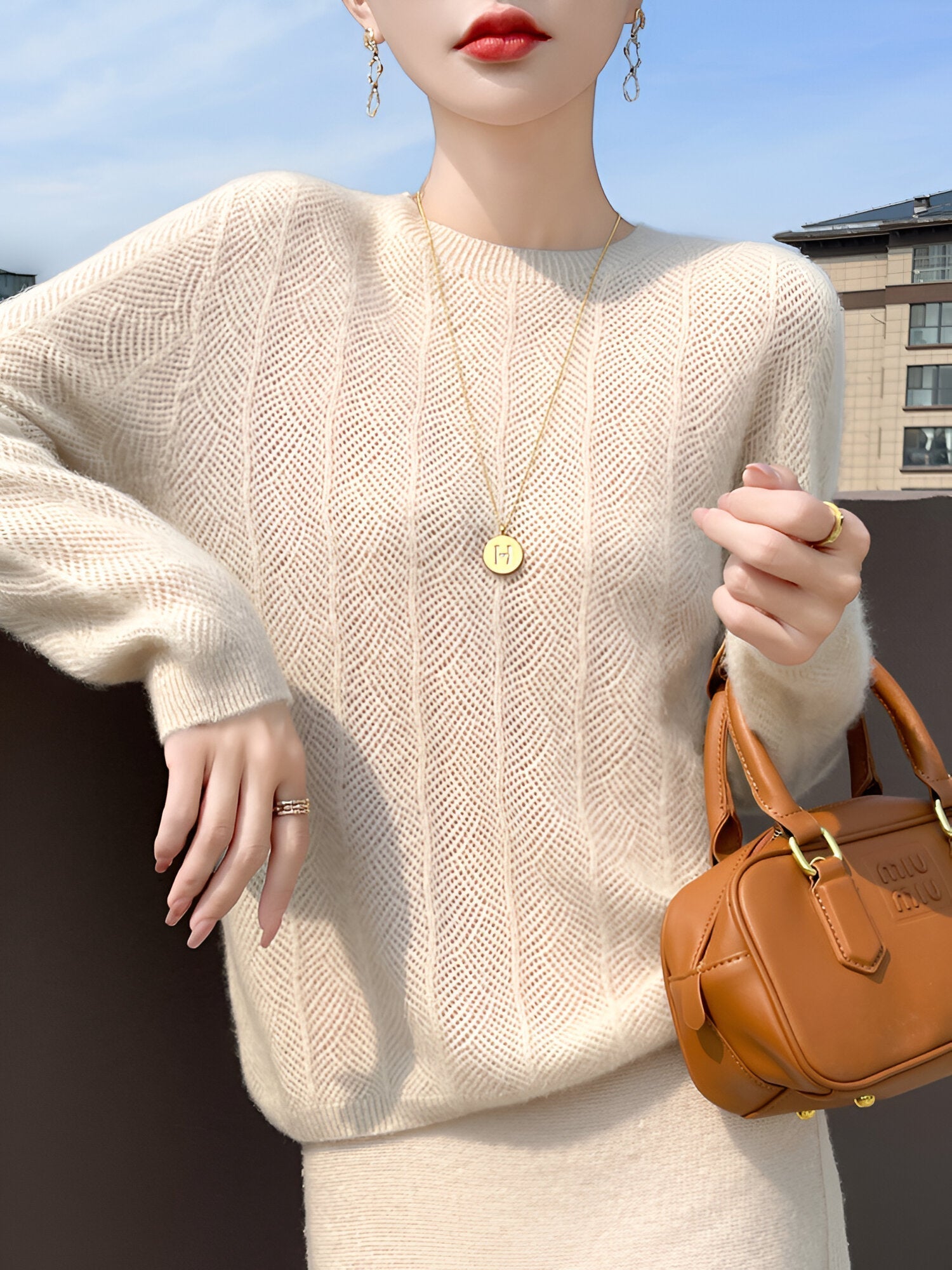 Mika - Pull en laine mérinos avec d'élégantes découpes